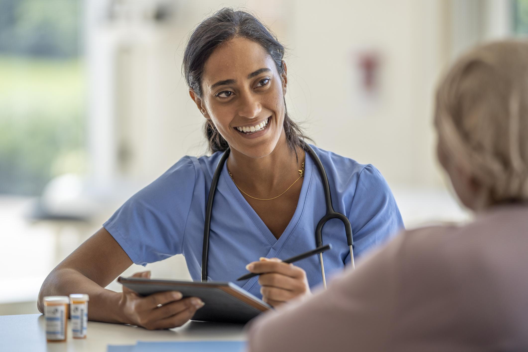 Nurse talking to a patient